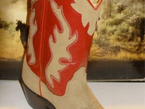 A pair of Youth SIZE 4.5 Red shaft, Roughout leather cowboy boots with red and tan accents.