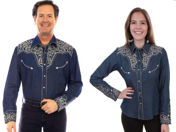 A man and woman standing next to each other in a Scully Women's Scroll Embroidered Denim Western Shirt.