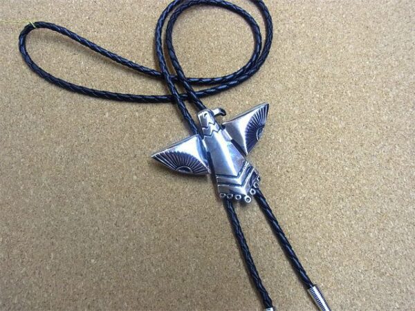 A Silver Western Phoenix Bolo Tie with a black leather cord.