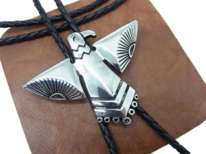 A Silver Western Phoenix Bolo Tie on a leather strap.