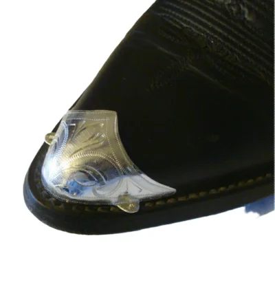 Silver engraved Cowboy boot tips <ul> <li>Sterling Silver plate</li> <li>3 /4 cover tip</li> <li>Laser Etched</li> <li>Western or "J" toe</li> </ul> •