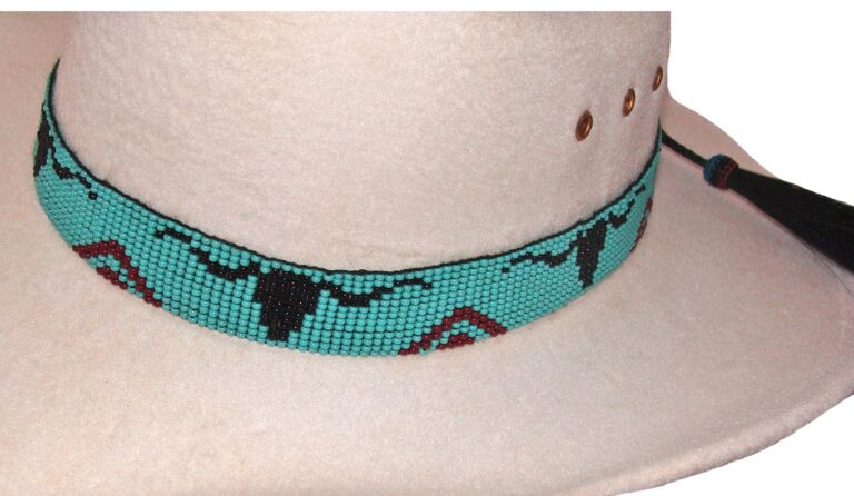 A Turquoise Longhorn Beaded Horse Hair Tassel Cowboy Hat Band with a tassel.