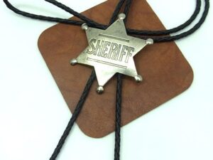 A Silver Sheriff Badge Bolo Tie is attached to a leather strap, creating a stylish bolo tie.