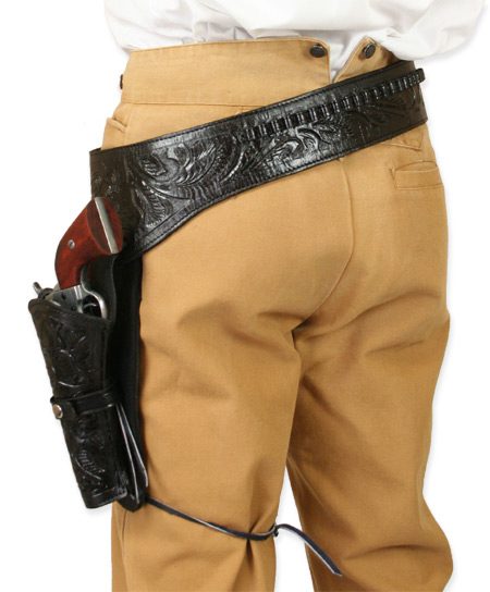 A man wearing a .45 Caliber Black Tooled Leather Single Western Gun Holster belt with a gun and a holster.