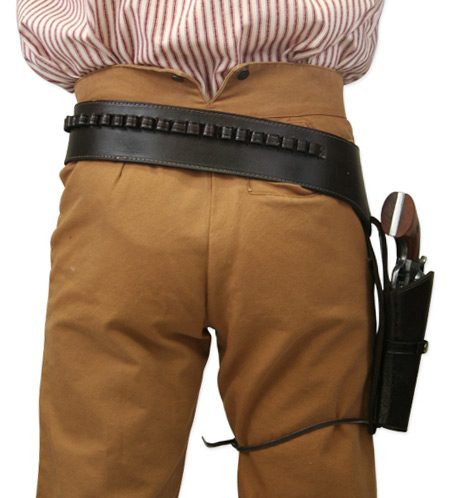 A man wearing a .45 Caliber Antique Brown Leather Single Western Gun Holster with a gun and a knife.