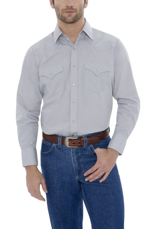 A man wearing jeans and a Mens Pearl snap Gray western shirt.