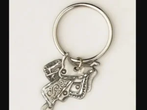 A Sterling Silver Gold boots western key chain with a horse on it.