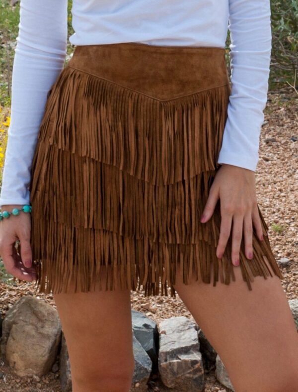 A woman wearing a Womens Brown Suede Full Fringe Short Western Skirt.