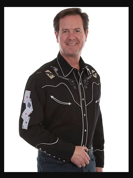 A man wearing a "Ghost Shootin Aces" Men's Scully Black Embroidered Western Shirt.