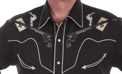 A man wearing the "Ghost Shootin Aces" Mens Scully Black Embroidered Western Shirt.