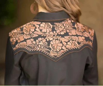 The back view of a woman wearing a Big Iron Scully Womens Black Embroidered Western Shirt, featuring womens western shirts.