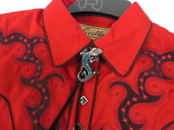 A red Turquoise Lizard Silver Bolo Tie.