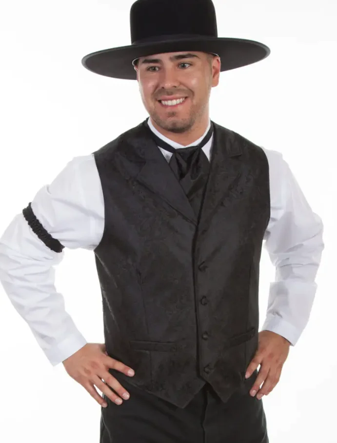 Man wearing black old western style vest and hat.