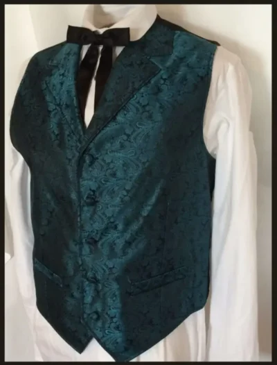 MENS TEAL PAISLEY DRESS WESTERN VEST <ul style="list-style: square inside none;"> <li>100% Polyester</li> <li>Classic Paisley vest</li> <li>S-6XL/ L-Tall-3X TALL</li> •