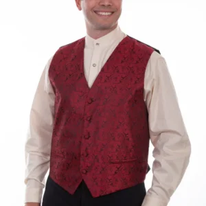 A man wearing a red patterned vest over a white shirt.