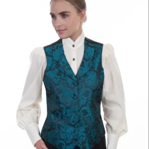 A woman wearing a teal floral vest over a white blouse.
