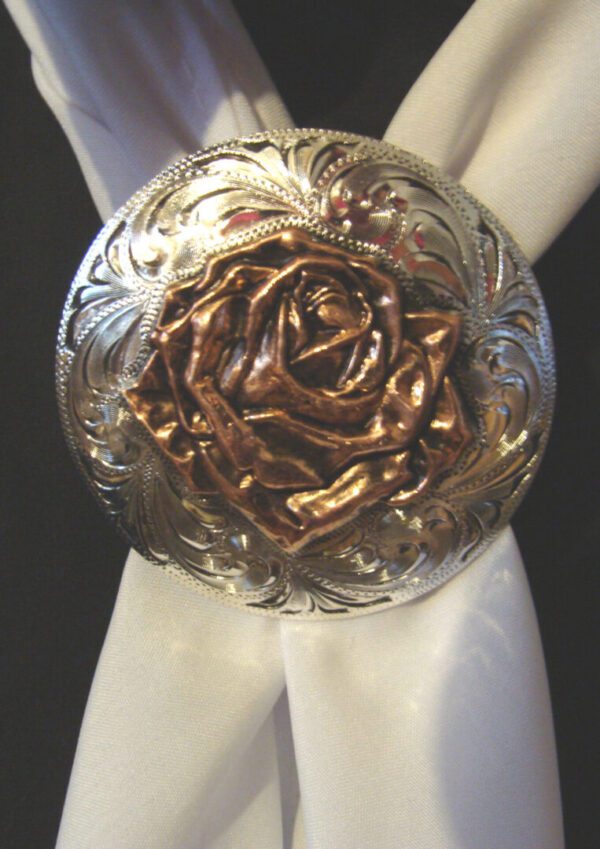 A Golden Rose Silver Western scarf slide with a rose on it.