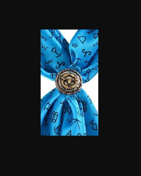 A blue Two Tone Longhorn Barbed Wire Western Scarf Slide with a symbol on it.