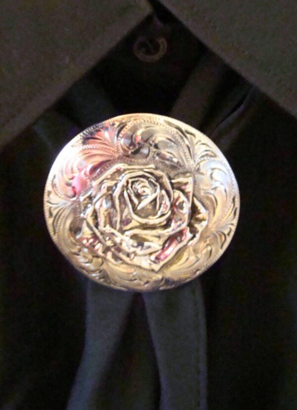 A Rose Silver Western scarf slide with a rose on it.