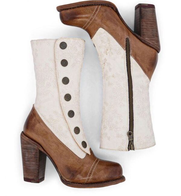 A pair of Amelia Tan Ivory Leather Button Snap Womens Zip Granny Boots with buttons.