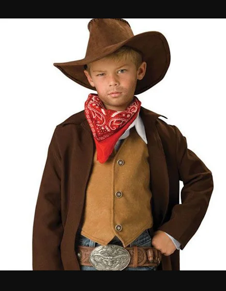 Boy wearing brown cowboy hat and vest.