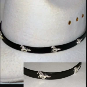 A black belt with white horse designs on a white mannequin.