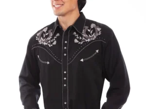 A man wearing a "Winners Circle" Mens Scully Black Horseshoe Western Shirt and jeans.