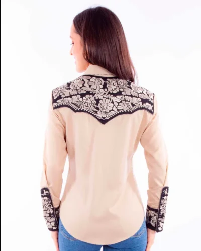 The back view of a woman wearing a Scully Two Tone Tan & Black Embroidered Women's Western Shirt.
