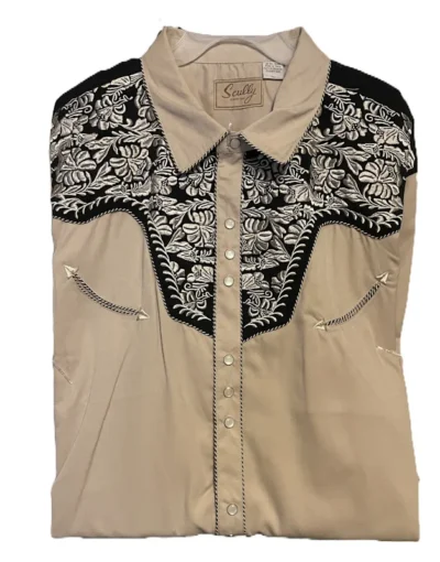 His and hers tan embroidered cowboy shirts