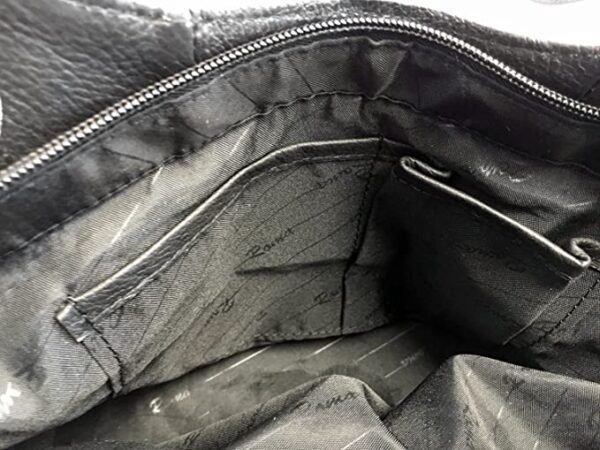A close up of the inside of the "Diane" Women's Black Leather Concealed Carry Handbag w/ Holster.