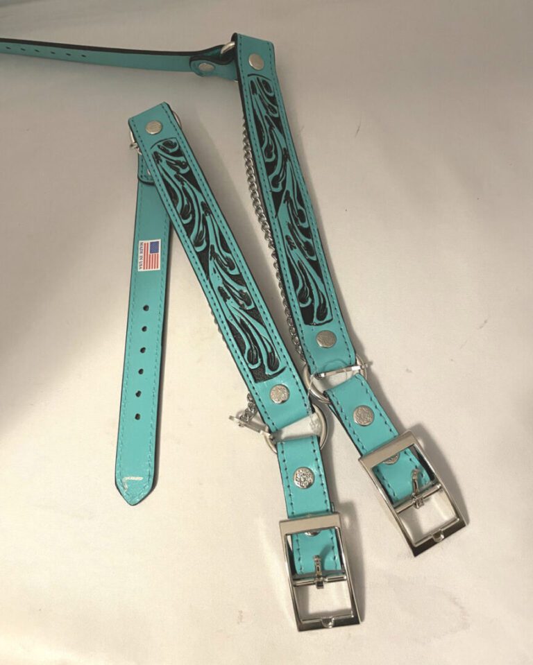 A pair of Turquoise & Black Tooled Leather Cowboy boot chains with silver buckles.