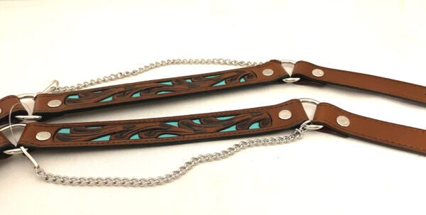 A pair of brown and Turquoise & Black Tooled Leather Cowboy boot chains.