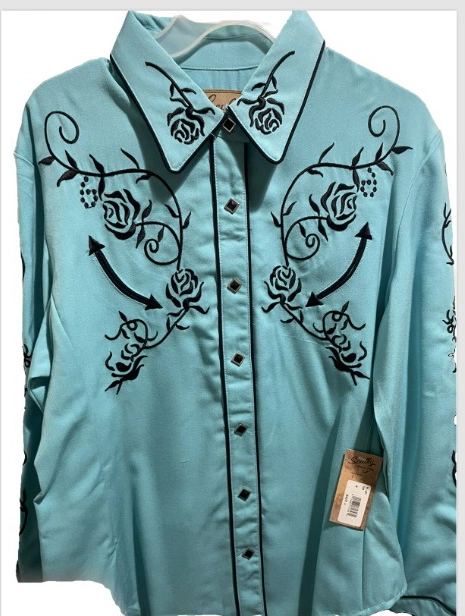 A Lady Ponderosa Scully women's Black Rose Turquoise western shirt with black roses on it.
