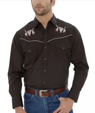 <div class="qsc-html-content"> Men's Skull Head with Feathers Embroidered Black Western Shirt Pearl Snaps <ul style="list-style: square inside none;"> <li>65% poly, 35% Cotton</li> <li>S- 2XL</li> <li>MATCHING WESTERN SHIRTS</li> </ul> </div> •